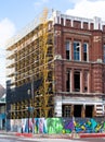 Renovations are ongoing on Galveston Island in Texas as evidenced by the scaffolding on this building in the Strand District Royalty Free Stock Photo