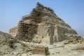 Scaffolding erected adjacent to the Step Pyramid in Egypt. Royalty Free Stock Photo