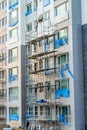 Scaffolding beside exterior wall of new highrise building Royalty Free Stock Photo