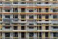 Scaffolding on facade, building under construction Royalty Free Stock Photo