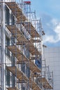 scaffolding on the facade of a house under construction Royalty Free Stock Photo