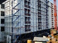 Scaffolding in front of building under construction