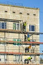 scaffolding installation works for the facade of a multi-storey residential house