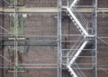 Scaffolding ladder against brick wall Royalty Free Stock Photo