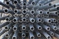 Scaffolding parts at construction site. Auxillary construction equipment Royalty Free Stock Photo