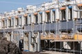 Row of semi-detached houses under construction in a new residential area Royalty Free Stock Photo