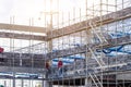 Scaffolding pipe clamp and parts,construction site with scaffold and building strength to scaffold clamps in used on construction Royalty Free Stock Photo