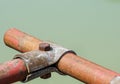 Scaffolding pipe clamp and parts, An important part of building strength to scaffold clamps in used close up on Royalty Free Stock Photo