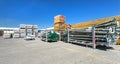 Scaffolding poles and brackets stacked in a yard. a blood test Royalty Free Stock Photo