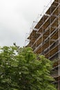 Scaffolding, renovation works being carried to building exterior.