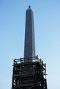 scaffolding at the repaired Obelisk Obelisk in Gatchina, Leningrad Region, Russia. Stage of dismantling of scaffolding. February 1