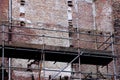 Scaffolding for the restoration of the facade of the building. M Royalty Free Stock Photo