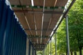 a scaffolding and wooden planks for protection and coverage on a construction site