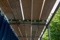 a scaffolding and wooden planks for protection and coverage on a construction site