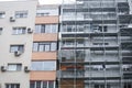 Scaffoldings on the facade of a block of flats Royalty Free Stock Photo