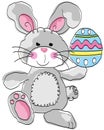 Cute funny gray rabbit holding a easter egg Royalty Free Stock Photo