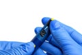 Scale on the bottom of insulin pen in hand of the doctor, self-injection medical equipment for diabetic patients
