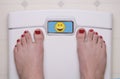 Scale with Feet Emoji Happy Royalty Free Stock Photo