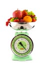 Scale with fruit for diet Royalty Free Stock Photo