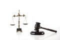 Scale of justice. Wooden judge`s gavel. The criminal law. Royalty Free Stock Photo