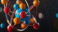 A scale model of an atom with each particle represented by a different color and size Royalty Free Stock Photo