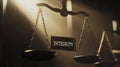 A scale with the word integrity written on it Royalty Free Stock Photo