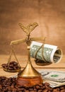 Scales cofee beans and money closeup Royalty Free Stock Photo