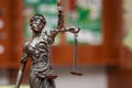 Scales of Justice, the symbol of a statue of blindfolded Themis