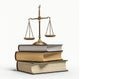 Scales of justice on top of stacked books isolated on a white background Royalty Free Stock Photo