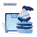 Scales and overweight woman sitting on big hamburger. Obesity health problem concept