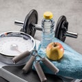 Scales, weight exercise accessories and natural diet food and drink Royalty Free Stock Photo