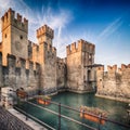 Scaliger Castle 13th century in Sirmione on Garda lake near Ve Royalty Free Stock Photo