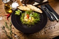 Scallop ceviche with mango, chilli and cilantro served with liquid ice smoke in a plate. Delicious healthy food closeup Royalty Free Stock Photo