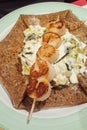 Scallop shellfish meat on skewer crepe with French pancake