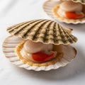 Are partially open revealing the scallop meat and bright orange roe Royalty Free Stock Photo