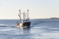 Scalloper Frontier homebound on hazy winter morning