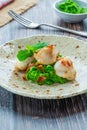 Scallops with minted peas