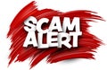 Scam alert paper word sign with red paint brush strokes over white Royalty Free Stock Photo