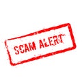 Scam alert red rubber stamp isolated on white. Royalty Free Stock Photo