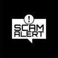 Scam alert sign isolated on dark background Royalty Free Stock Photo