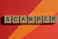 Scamper, business acronym in 3D wooden alphabet letters