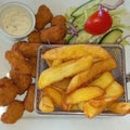scampi and chunky chips with tartare sauce and salad Royalty Free Stock Photo