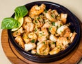 Scampi shrimp meal in the black pot plate Royalty Free Stock Photo