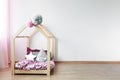 Scandi bed in girl`s bedroom Royalty Free Stock Photo