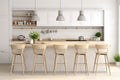 Scandinavian bar stools decorate a modern kitchen in calm neutral tones Royalty Free Stock Photo