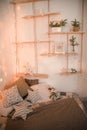 Scandinavian bedroom interior for the New Year. Background for a Christmas card in light colors of a bedroom Rustic bed with pillo