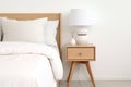 Scandinavian bedside tables decorate a modern bedroom with calm white tones and light wood