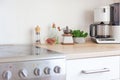 Scandinavian classic minimalistic kitchen with white and wooden details. Modern white kitchen clean contemporary style interior Royalty Free Stock Photo