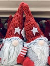 Scandinavian gnome in red hat decorative christmas toy in the supermarket, nobody pair