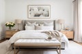 A Scandinavian-inspired bedroom with a luxurious upholstered bed, crisp white linens, and soft neutral tones. Royalty Free Stock Photo